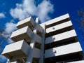 White concrete exterior building facade perspective view with blue sky Royalty Free Stock Photo