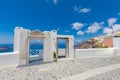 White concrete entrance staircases leading down to beautiful bay with clear blue sky and sea Royalty Free Stock Photo