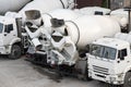 white concrete mixers are on the construction site Royalty Free Stock Photo