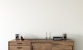 white concrete mock-up wall with wooden console and decoration, modern interior, negative copy space above