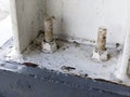 White Concrete Sill Anchor Bolt on Concrete Foundation. Two Concrete Bolts for Fixing Supported Connection Between Base Floor