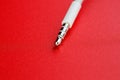 White connector AUX white cable on a red background Royalty Free Stock Photo