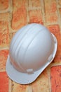 Hart hat on wall background Royalty Free Stock Photo