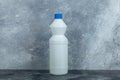 White container of bleach on marble background Royalty Free Stock Photo