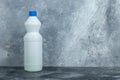 White container of bleach on marble background Royalty Free Stock Photo