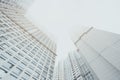 White contemporary residential skyscraper apartment building, two housing body