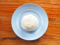 White cooked rice on blue plate Royalty Free Stock Photo