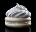 a white cookie with whipped cream on top