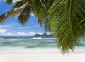 White coral beach sand and azure indian ocean. Royalty Free Stock Photo