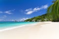 White coral beach sand and azure indian ocean. Royalty Free Stock Photo