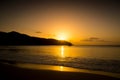 White coral beach sand and azure indian ocean. Sunset yacht.