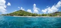 White coral sand on tropical beach. La Digue island, Seyshelles. Royalty Free Stock Photo
