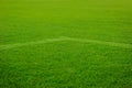 White corner line goal on grass soccer field Royalty Free Stock Photo