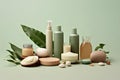 White cosmetic bottles, eucalyptus flowers, towels, soap on green background. Top view, flat lay. Natural organic beauty