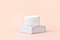 Blank white plastic container for cream, lotion, nourishing or moisturizing mask on stand. Feminine hygienic product