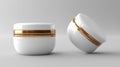 White Cosmetic Jars With Gold Accents Royalty Free Stock Photo