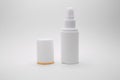 White cosmetic spray bottle