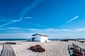 White cottage on the beach Royalty Free Stock Photo