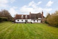 17th century white thatched cottage Royalty Free Stock Photo