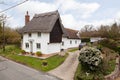 17th century white thatched cottage Royalty Free Stock Photo