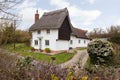 17th century white thatched cottage Royalty Free Stock Photo