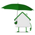 White cottage with green umbrella