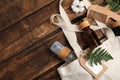 White cotton bag with eco friendly personal care products on wooden table, flat lay. Space for text Royalty Free Stock Photo