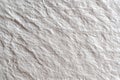 White cotton paper surface seen from top angle, displaying minimalistic texture for use in mockups, product presentations, or fine Royalty Free Stock Photo