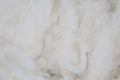 White cotton texture is soft, fluffy wadding background closeup