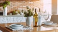 White Cozy Kitchen Table at Home Provence Interior. Champagne Bottle for Honey Dinner Date on Light Wooden Counter. Cozy