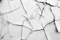 White cracked background wall with peeling cement. Grunge pattern on a gray rough texture Royalty Free Stock Photo