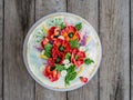 White cream cake decorated with buttercream flowers, Poppies, chamomile, cornflowers, spikelets of wheat, on gray background. Royalty Free Stock Photo