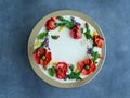 White cream cake decorated with buttercream flowers, Poppies, chamomile, cornflowers, spikelets of wheat, on gray background. Royalty Free Stock Photo