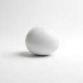 White creating a minimalist and serene composition. The egg is ovoid and Royalty Free Stock Photo