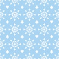 White creative snowflakes made from card suits on blue background. Seamless pattern, playing card Royalty Free Stock Photo