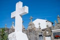 White cross in the foreground of a Catholic cemetery in Galicia. Spain Royalty Free Stock Photo