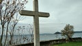 White Cross Overlooking Bay Royalty Free Stock Photo