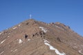 White cross on top of mountain. Royalty Free Stock Photo