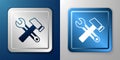 White Crossed hammer and wrench spanner icon isolated on blue and grey background. Hardware tools. Silver and blue