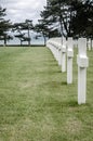 White crosses in American Cemetery, Coleville-sur-Mer, Omaha Beach, Normandy, France. Royalty Free Stock Photo