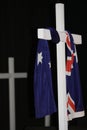 White crosses with Australian National flag draped over it. Royalty Free Stock Photo