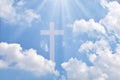 White Crucifix with Bright Blue Sky and beautiful clouds background.