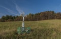 White crucifix near path from Zitkova village in autumn morning Royalty Free Stock Photo