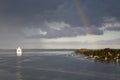 White cruise liner and rainbow Royalty Free Stock Photo