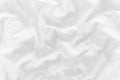 White crumpled bed sheet closeup from above Royalty Free Stock Photo