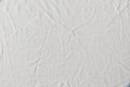 White crumpled linen cloth background.