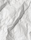 White crumpled paper texture for background. White battered paper. White empty leaf of crumpled paper. Torn surface