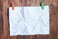 White crumpled paper on wood background Royalty Free Stock Photo