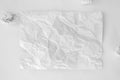 White crumpled paper backdrop on white background. Backplate for your text Royalty Free Stock Photo