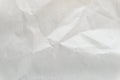 White crumpled wrapping paper background, texture of grey wrinkled of old vintage paper, creases on the surface of gray paper Royalty Free Stock Photo